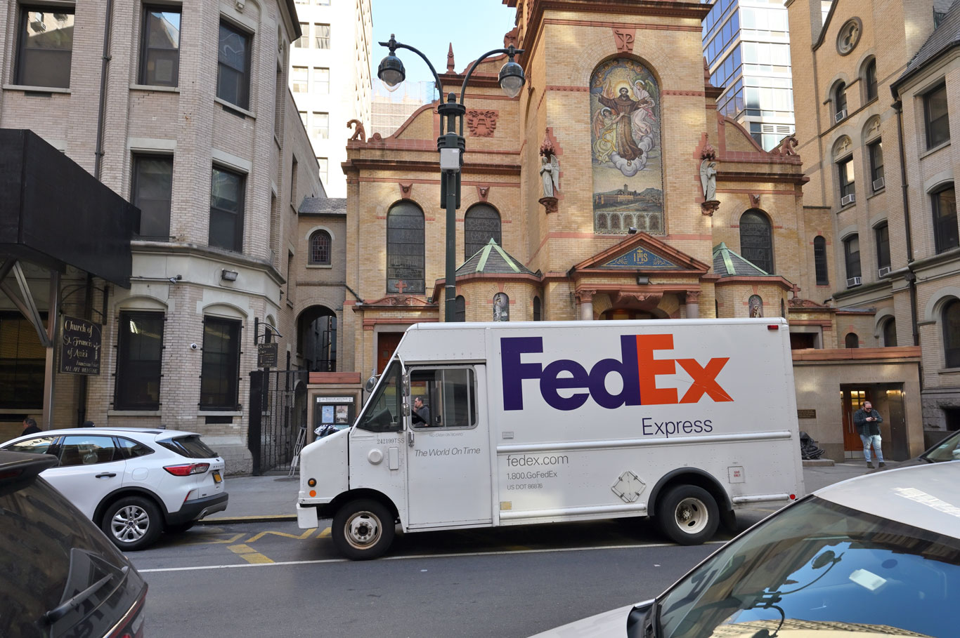 FedEx truck parked outside of a church